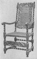 This reproduction of a Charles II chair shows cherubs
supporting crowns.