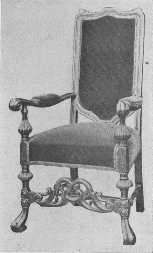 Reproduction of chair showing the transition between the
time of Charles II and William and Mary. The carved strut remains but
the back is lower and simpler.