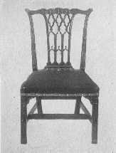 Two important phases of Chippendale's work—an elaborate
ribbon-back chair, and one of the more staid Gothic type.