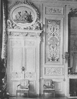 A beautiful doorway in the bedroom of the Empress,
Compiègne. The fastening shows how much thought was expended on small
matters, so the balance of decoration would be kept. The chairs are
Louis XVI.