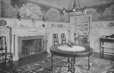 There are few treatments for walls in a Colonial
dining-room that can compare with paneled walls, or wainscoting with a
decorative paper above. The subject, however, must be in keeping. This
paper is extremely inappropriate, and the center light is also badly
chosen and could be eliminated.