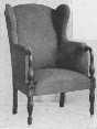A wing-chair with a painted frame is comfortable and
harmonizes with painted furniture.