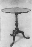 This Chippendale pie crust tip table shows the tripod
base with claw feet and the carved edge which gives it its name, and
which was carved down to the level, never applied. A genuine antique pie
crust table is very valuable.