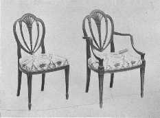 These chairs are reproductions of designs by the Adam
Brothers. They are of satinwood, covered with damask. This design was
also used by Hepplewhite.