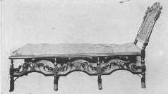 The first day beds, or chaise longue, were made during
the Jacobean period. As will be seen, this "stretcher," as they were
also called, has Charles II influence in its carving and Spanish feet.