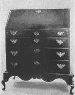 The Hancock desk was a design greatly favored in America
in the eighteenth century. This fine example dates from about 1750.