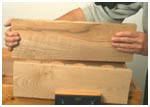Place the biscuits into the slots and clamp the planks together